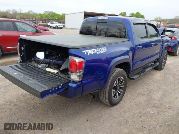 2023 Toyota Tacoma SR z VIN 3TMCZ5AN1PM589061, wystawiony jako IAAI lot #41936717 z przebiegiem 41 395 mil mil oraz . Historia ofert i sprzedaży dostępna na DreamBid. Obrazek 4.
