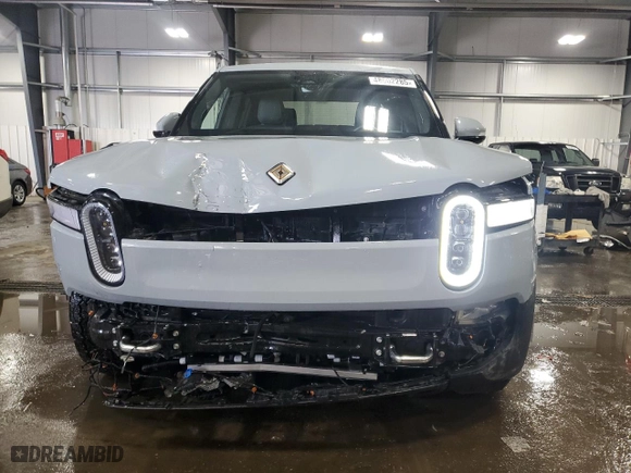 2022 Rivian R1T Launch Edition with VIN 7FCTGAALXNN005332, listed as a Copart auction lot 48002285 with NaN miles and Salvage Title. Bid and sale history available at carsss.com. Image 5.