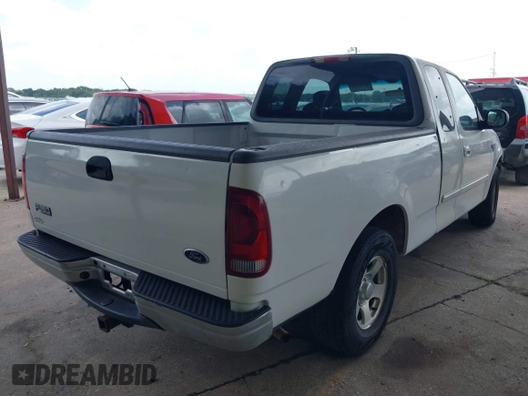 2003 Ford F-150 XL with VIN 1FTRX17L23NA85083, listed as a IAAI auction lot 42534913 with 192,195 mi miles and . Bid and sale history available at DreamBid. Image 4.