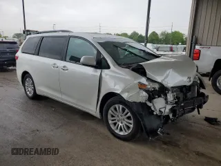 2016 Toyota Sienna XLE with VIN 5TDYK3DC8GS729616, listed as a Copart auction lot 59748995 with 144,469 mi miles and Salvage title. Bid and sale history available at DreamBid. Image 4.