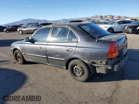 2005 Hyundai Accent GLS with VIN KMHCG45C95U665574, listed as a Copart auction lot 82603804 with 154,187 mi miles and Salvage Title. Bid and sale history available at carsss.com. Image 2.
