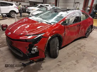 2024 Toyota Prius LE z VIN JTDADABU8R3013976, wystawiony jako IAAI lot #41621800 z przebiegiem 7475 mil mil oraz . Historia ofert i sprzedaży dostępna na DreamBid. Obrazek 2.
