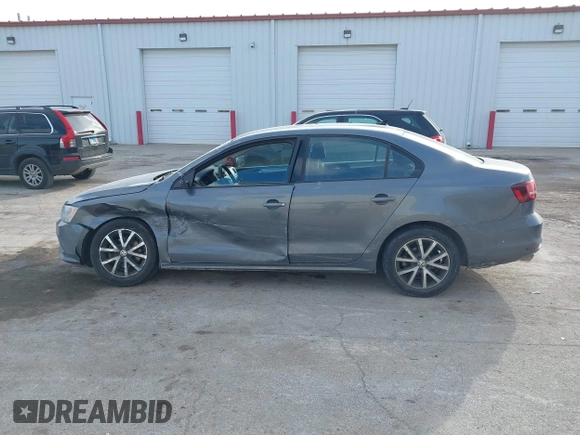2016 Volkswagen Jetta Sedan 1.4T SE with VIN 3VWD67AJ7GM281671, listed as a IAAI auction lot 41385896 with 153,168 mi miles. Bid and sale history available at carsss.com. Image 14.
