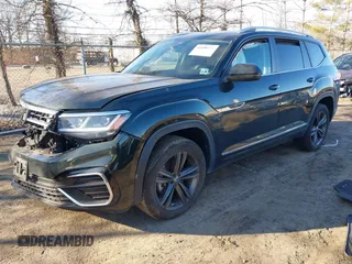 2022 Volkswagen Atlas SEL R-Line z VIN 1V2AR2CA9NC505811, wystawiony jako IAAI lot #41458521 z przebiegiem 32 621 mil mil oraz . Historia ofert i sprzedaży dostępna na DreamBid. Obrazek 2.