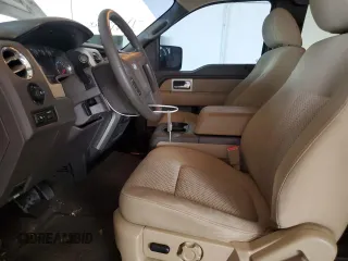2010 Ford F-150 XL with VIN 1FTFX1CV0AFA82944, listed as a Copart auction lot 62912345 with 104,967 mi miles and Salvage title. Bid and sale history available at DreamBid. Image 7.