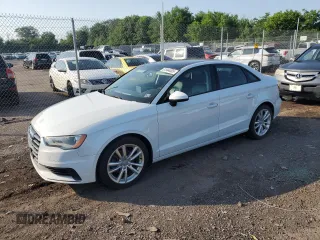 2015 Audi A3 Premium with VIN WAUAJGFF9F1069405, listed as a Copart auction lot 61944005 with 57,370 mi miles and Salvage title. Bid and sale history available at DreamBid. Image 1.