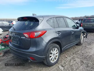 2014 Mazda CX-5 Touring with VIN JM3KE4CY6E0387767, listed as a IAAI auction lot 41698128 with 1 mi miles. Bid and sale history available at carsss.com. Image 4.