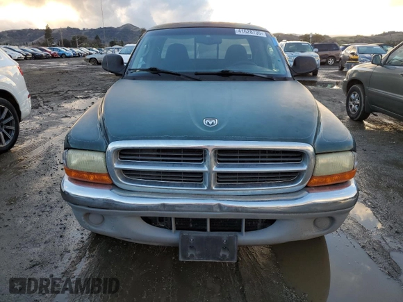 2001 Dodge Dakota z VIN 1B7GL22X51S315149, wystawiony jako Copart lot #41628735 z przebiegiem 295 276 mil mil oraz Czysty tytuł • Clean title. Historia ofert i sprzedaży dostępna na DreamBid. Obrazek 5.