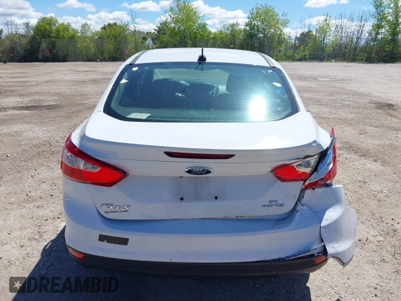2013 Ford Focus SE with VIN 1FADP3F23DL218239, listed as a IAAI auction lot 42331440 with 156,501 mi miles and . Bid and sale history available at DreamBid. Image 17.