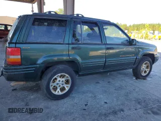 1998 Jeep Grand Cherokee Limited with VIN 1J4GZ78Y8WC261353, listed as a Copart auction lot 76605944 with 156,883 mi miles and Salvage Title. Bid and sale history available at carsss.com. Image 3.