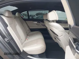 2016 BMW 7 Series 740i with VIN WBA7E2C56GG546920, listed as a IAAI auction lot 41610698 with 119,689 mi miles. Bid and sale history available at carsss.com. Image 8.