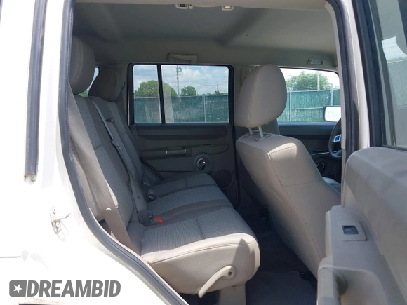 2009 Jeep Commander Sport with VIN 1J8HH48K89C550446, listed as a IAAI auction lot 42505106 with 124,299 mi miles and . Bid and sale history available at DreamBid. Image 8.