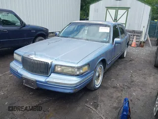 1995 Lincoln Town Car Executive with VIN 1LNLM81W9SY676031, listed as a IAAI auction lot 42537591 with 97,467 mi miles and . Bid and sale history available at DreamBid. Image 2.