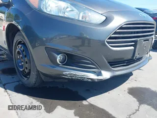 2019 Ford Fiesta SE z VIN 3FADP4BJ2KM131012, wystawiony jako IAAI lot #42228822 z przebiegiem 100 460 mil mil oraz . Historia ofert i sprzedaży dostępna na DreamBid. Obrazek 6.