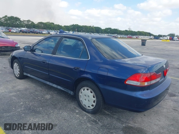 2002 Honda Accord LX with VIN JHMCG56482C014034, listed as a IAAI auction lot 42110164 with 95,657 mi miles and . Bid and sale history available at DreamBid. Image 3.