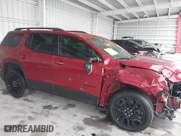 2023 GMC Acadia SLT with VIN 1GKKNMLS4PZ174923, listed as a IAAI auction lot 41393635 with 22,174 mi miles and . Bid and sale history available at DreamBid. Image 6.