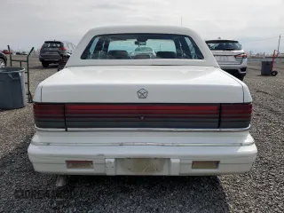 1992 Chrysler LeBaron z VIN 3C3XA5633NT336573, wystawiony jako Copart lot #54551495 z przebiegiem Nie podano mil oraz Tytuł czysty. Historia ofert i sprzedaży dostępna na DreamBid. Obrazek 6.
