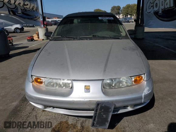 2002 Saturn SL with VIN 1G8ZH52882Z177307, listed as a Copart auction lot 59407345 with 63,864 mi miles and Clean title. Bid and sale history available at DreamBid. Image 5.