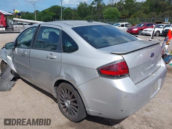 2011 Ford Focus SES with VIN 1FAHP3GN9BW107720, listed as a IAAI auction lot 41949472 with 238,639 mi miles. Bid and sale history available at carsss.com. Image 3.