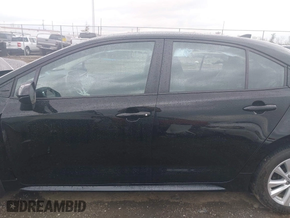 2023 Toyota Corolla LE with VIN 5YFB4MDE1PP058774, listed as a IAAI auction lot 42068978 with 19,802 mi miles and . Bid and sale history available at DreamBid. Image 14.
