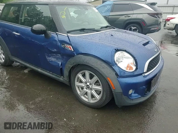 2013 MINI Hardtop S with VIN WMWSV3C55DT387777, listed as a Copart auction lot 56495215 with 53,033 mi miles and Salvage title. Bid and sale history available at DreamBid. Image 13.