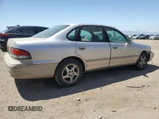 1997 Toyota Avalon XL with VIN 4T1BF12B0VU187179, listed as a Copart auction lot 54708565 with 336,922 mi miles and Salvage Title. Bid and sale history available at DreamBid. Image 3.