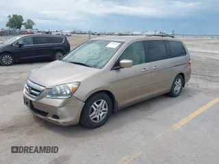 2005 Honda Odyssey EX with VIN 5FNRL38475B029026, listed as a IAAI auction lot 42489079 with 156,075 mi miles and . Bid and sale history available at DreamBid. Image 2.