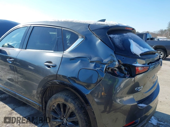 2022 Mazda CX-5 2.5 Turbo with VIN JM3KFBAY1N0526661, listed as a IAAI auction lot 41350659 with 22,963 mi miles and . Bid and sale history available at carsss.com. Image 6.