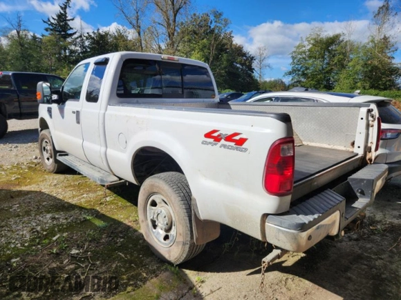 2009 Ford F-350 XL with VIN 1FTWX31579EA59709, listed as a Copart auction lot 69289714 with 231,511 mi miles and Salvage Title. Bid and sale history available at DreamBid. Image 2.