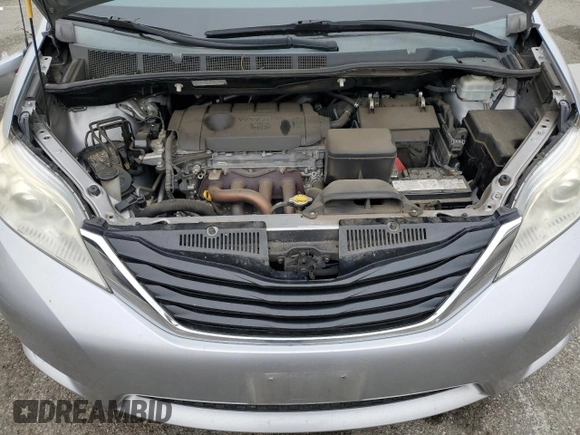 2012 Toyota Sienna with VIN 5TDKA3DC4CS014867, listed as a Copart auction lot 43191655 with 169,517 mi miles and Salvage Title. Bid and sale history available at DreamBid. Image 12.