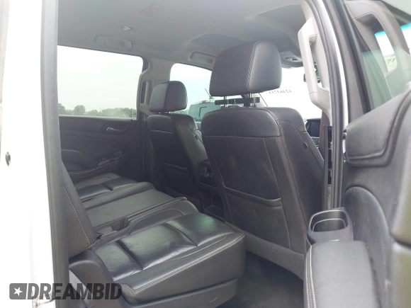 2016 Chevrolet Suburban LT with VIN 1GNSKHKC9GR263027, listed as a IAAI auction lot 42463711 with Not provided miles and . Bid and sale history available at DreamBid. Image 8.
