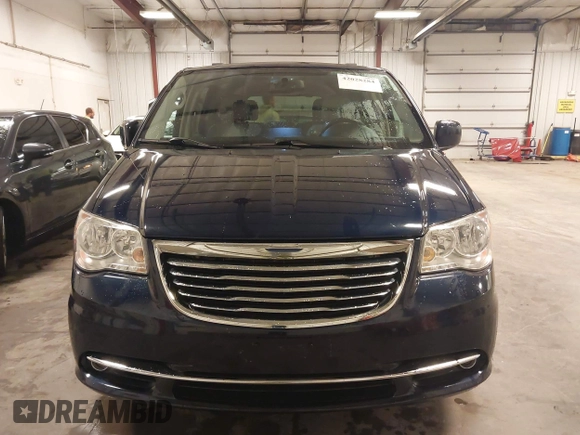 2013 Chrysler Town & Country Touring with VIN 2C4RC1BG7DR517970, listed as a IAAI auction lot 42028284 with 122,053 mi miles. Bid and sale history available at carsss.com. Image 13.