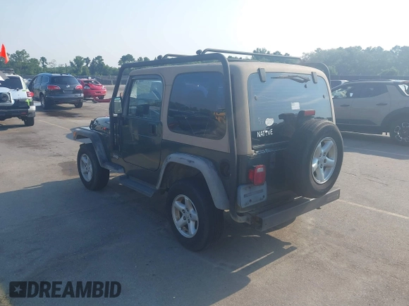 2002 Jeep Wrangler X with VIN 1J4FA39S72P733034, listed as a IAAI auction lot 42659447 with 200,786 mi miles and . Bid and sale history available at DreamBid. Image 3.