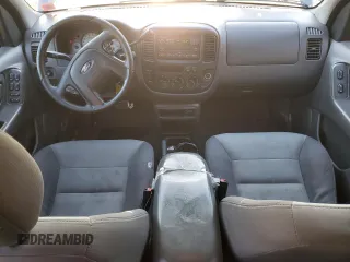 2004 Ford Escape XLS with VIN 1FMCU92134KB88319, listed as a Copart auction lot 84243494 with 158,052 mi miles and Salvage Title. Bid and sale history available at DreamBid. Image 8.