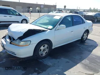 2001 Honda Accord EX z VIN 1HGCG16501A074615, wystawiony jako IAAI lot #42297708 z przebiegiem 187 936 mil mil oraz . Historia ofert i sprzedaży dostępna na DreamBid. Obrazek 2.