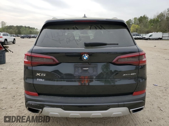 2021 BMW X5 xDrive40i with VIN 5UXCR6C08M9D83268, listed as a Copart auction lot 51781335 with 97,885 mi miles and Salvage title. Bid and sale history available at DreamBid. Image 6.
