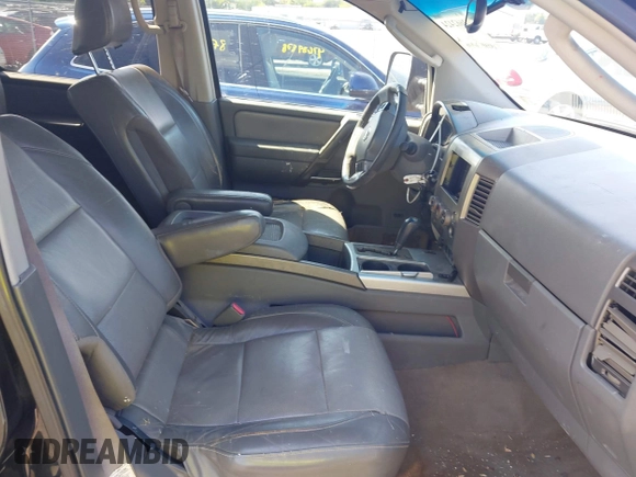 2005 Nissan Titan LE with VIN 1N6AA07B05N509859, listed as a IAAI auction lot 42662424 with 252,000 mi miles and . Bid and sale history available at DreamBid. Image 5.
