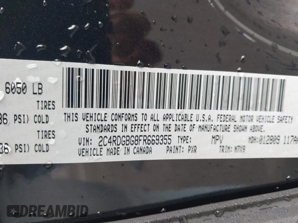 2015 Dodge Grand Caravan SE with VIN 2C4RDGBG8FR669355, listed as a IAAI auction lot 41486867 with 189,650 mi miles and . Bid and sale history available at DreamBid. Image 9.