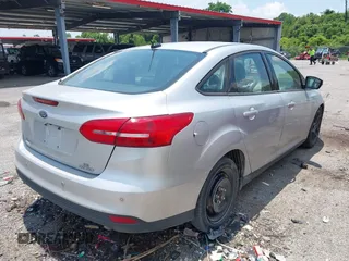 2016 Ford Focus SE with VIN 1FADP3F29GL231310, listed as a IAAI auction lot 42396437 with 170,175 mi miles and . Bid and sale history available at DreamBid. Image 4.