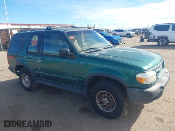 1999 Ford Explorer Sport with VIN 1FMYU22X2XUB19728, listed as a IAAI auction lot 41642358 with 128,788 mi miles and . Bid and sale history available at DreamBid. Image 1.