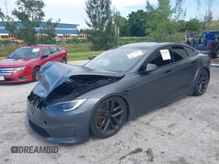 2023 Tesla Model S with VIN 5YJSA1E54PF501565, listed as a IAAI auction lot 42244953 with Not provided miles and . Bid and sale history available at DreamBid. Image 2.