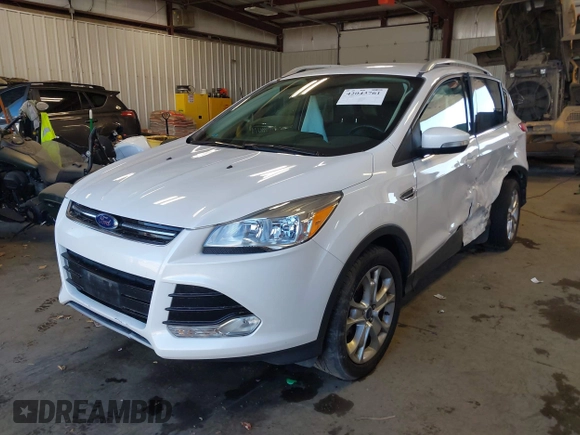 2016 Ford Escape Titanium with VIN 1FMCU9J94GUC28648, listed as a IAAI auction lot 42043761 with 82,509 mi miles and . Bid and sale history available at DreamBid. Image 17.
