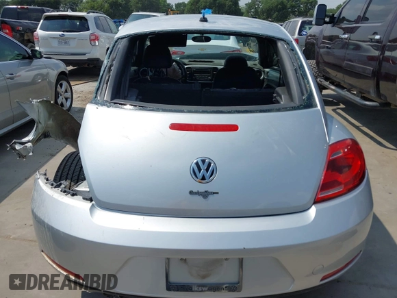 2013 Volkswagen Beetle 2.5L with VIN 3VWJX7AT7DM673319, listed as a IAAI auction lot 42169554 with 128,622 mi miles and . Bid and sale history available at DreamBid. Image 17.