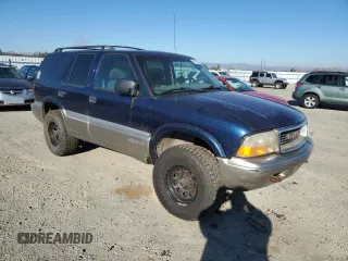 2000 GMC Jimmy SLE Convenience with VIN 1GKDT13W8Y2330794, listed as a Copart auction lot 87745825 with 168,128 mi miles and Clean Title. Bid and sale history available at carsss.com. Image 4.