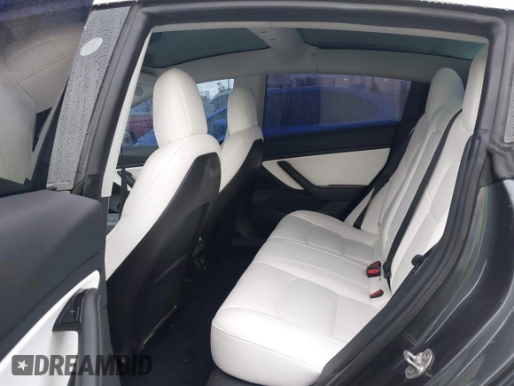 2018 Tesla Model 3 Long Range Battery with VIN 5YJ3E1EB1JF149423, listed as a IAAI auction lot 41896090 with 158,787 mi miles and . Bid and sale history available at DreamBid. Image 8.