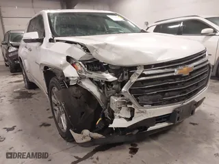 2018 Chevrolet Traverse Premier with VIN 1GNEVJKW2JJ103924, listed as a IAAI auction lot 41576128 with 128,694 mi miles. Bid and sale history available at carsss.com. Image 6.