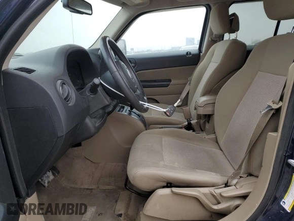 2013 Jeep Patriot Latitude with VIN 1C4NJPFA2DD238409, listed as a Copart auction lot 43657345 with 136,183 mi miles and Salvage Title. Bid and sale history available at carsss.com. Image 7.