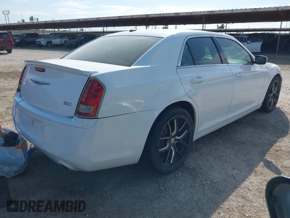 2013 Chrysler 300 Motown with VIN 2C3CCAAGXDH530004, listed as a IAAI auction lot 41973189 with 105,213 mi miles. Bid and sale history available at carsss.com. Image 4.