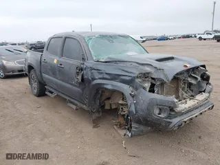 2023 Toyota Tacoma 4WD SR with VIN 3TMCZ5AN6PM554838, listed as a IAAI auction lot 41215603 with 1 mi miles. Bid and sale history available at carsss.com. Image 1.