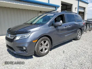 2018 Honda Odyssey EX-L z VIN 5FNRL6H70JB000036, wystawiony jako Copart lot #50455365 z przebiegiem 141 010 mil mil oraz Szkoda całkowita • Salvage title. Historia ofert i sprzedaży dostępna na DreamBid. Obrazek 1.